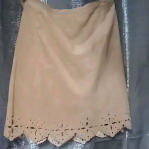 Suede skirt with cut out embellishments